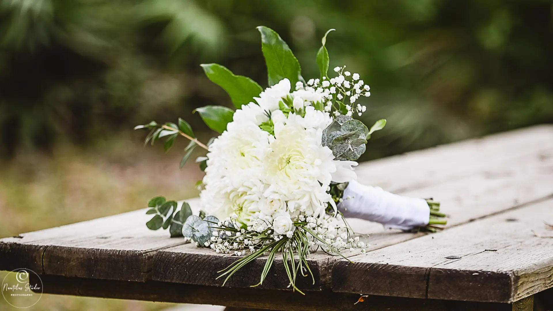 Photo showing a bridal bouquet with white Spider Mums