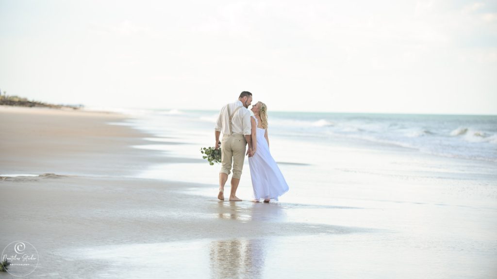 Boda St Agustíne recién casados ​​en la playa